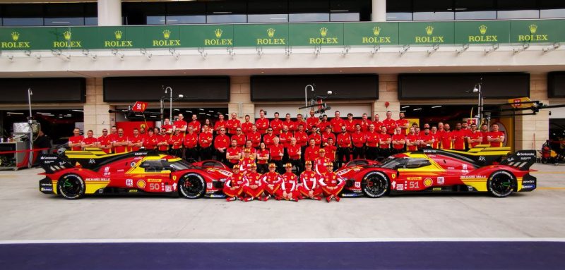 The Ferrari team gather for a team photo at the 2024 Prologue in the FIA World Endurance Championship