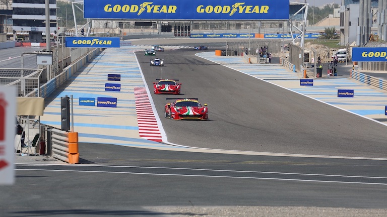 Two Ferraris battling at the 2021 6 Hours of Bahrain WEC race